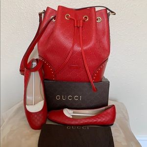 Red leather Gucci flats.